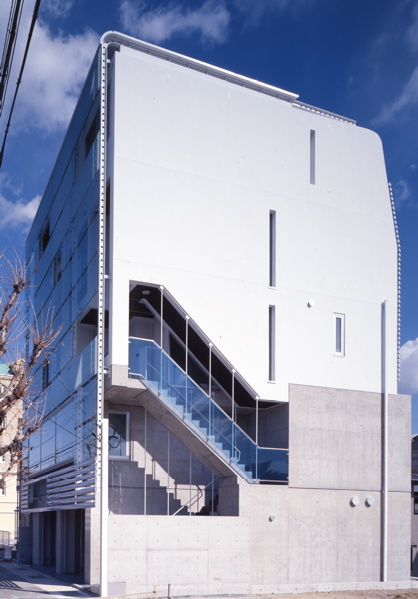 4 in 1 - Concordia Ashiya 4 in 1 is a small-scale apartment house, which incorporates three residential units and a shop unit. The structural system consists of thin RC wall, culvert system floors and the shear resistance internal walls wherever the layout requires. This system allows freedom in layout and ensures the structural stability. The building is fully glazed on the north and south side to provide views of sea and mountains, while east and west side is enclosed considering the possibility of future construction in adjacent currently empty plot. The external skin of this building is composed of soundproof glass wall, roof and the louvers wrapped around the building. <br />(Osaka Governor's Prize at Osaka Architecture Competition)<br />